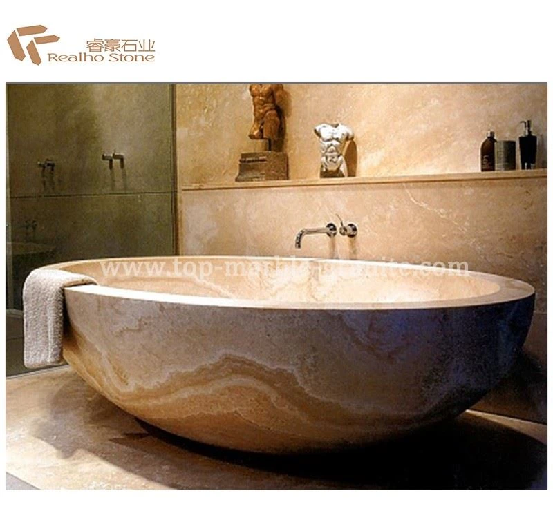 Beige travertine bathtub with honed finish